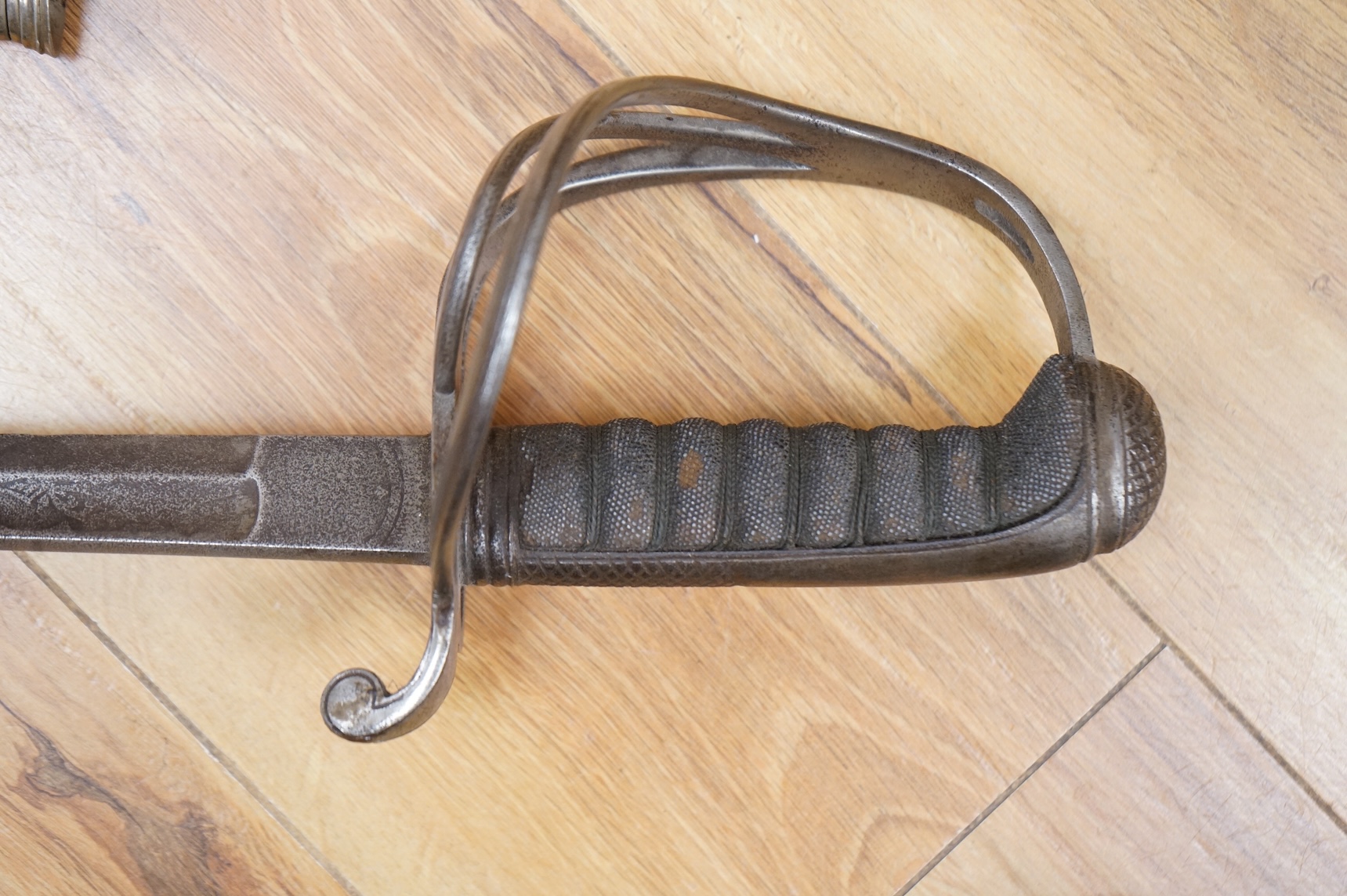 A 1796 pattern cavalry officer’s sword, blade etched J. Runkel, Solingen, regulation blade, in fair condition, grip wormed, together with an 1822 pattern sword blade, etched; Honourable Horse Artillery Company, moderatel